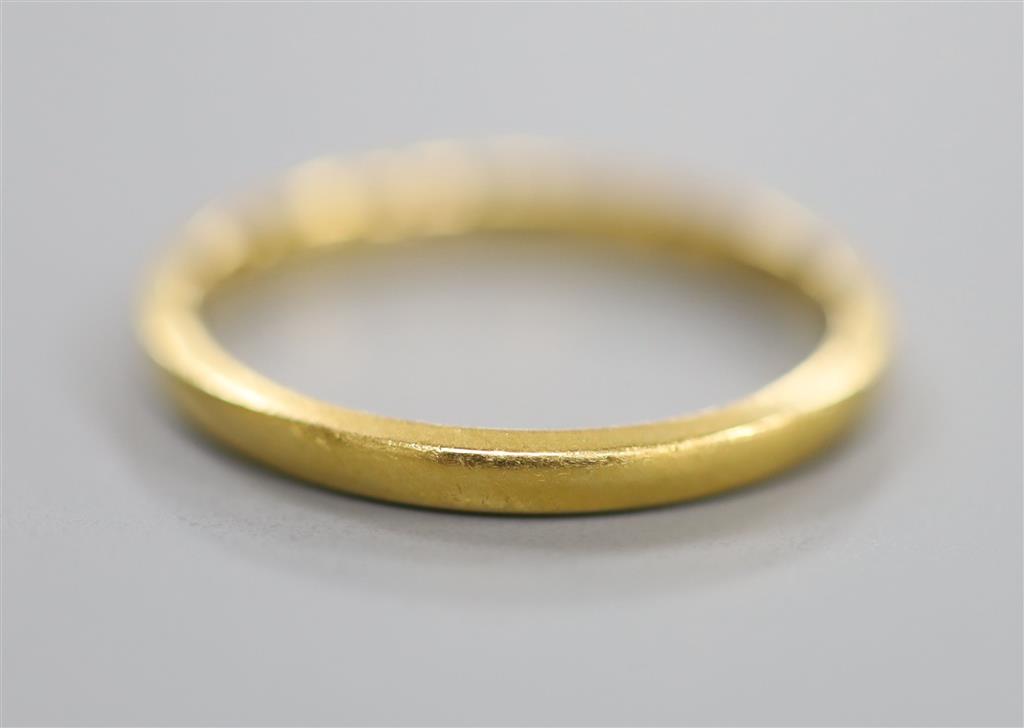 A 22ct gold wedding ring, size J/K, 1.9 grams.
